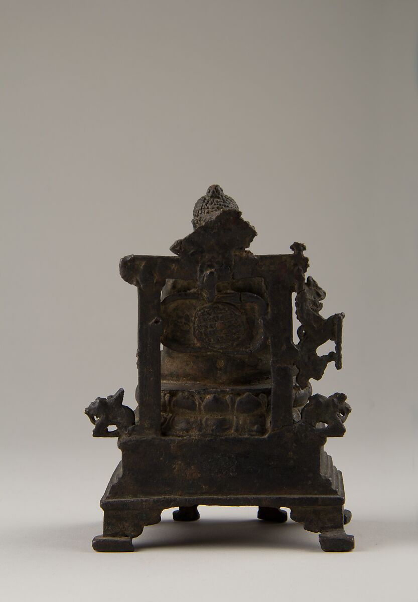 Enthroned Preaching Buddha, Bronze with silver inlay, India (Bihar)