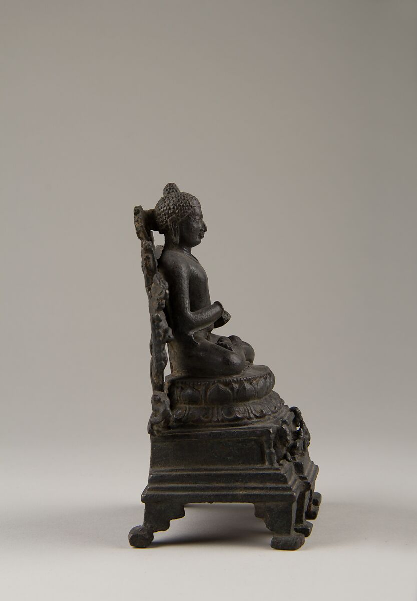 Enthroned Preaching Buddha, Bronze with silver inlay, India (Bihar)