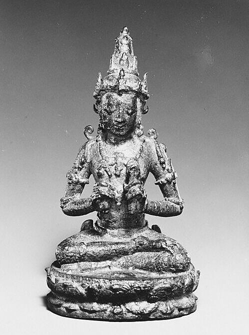 Seated Male Deity Holding Two Ritual Objects, Bronze, Indonesia (Java, Ndangjuk) 