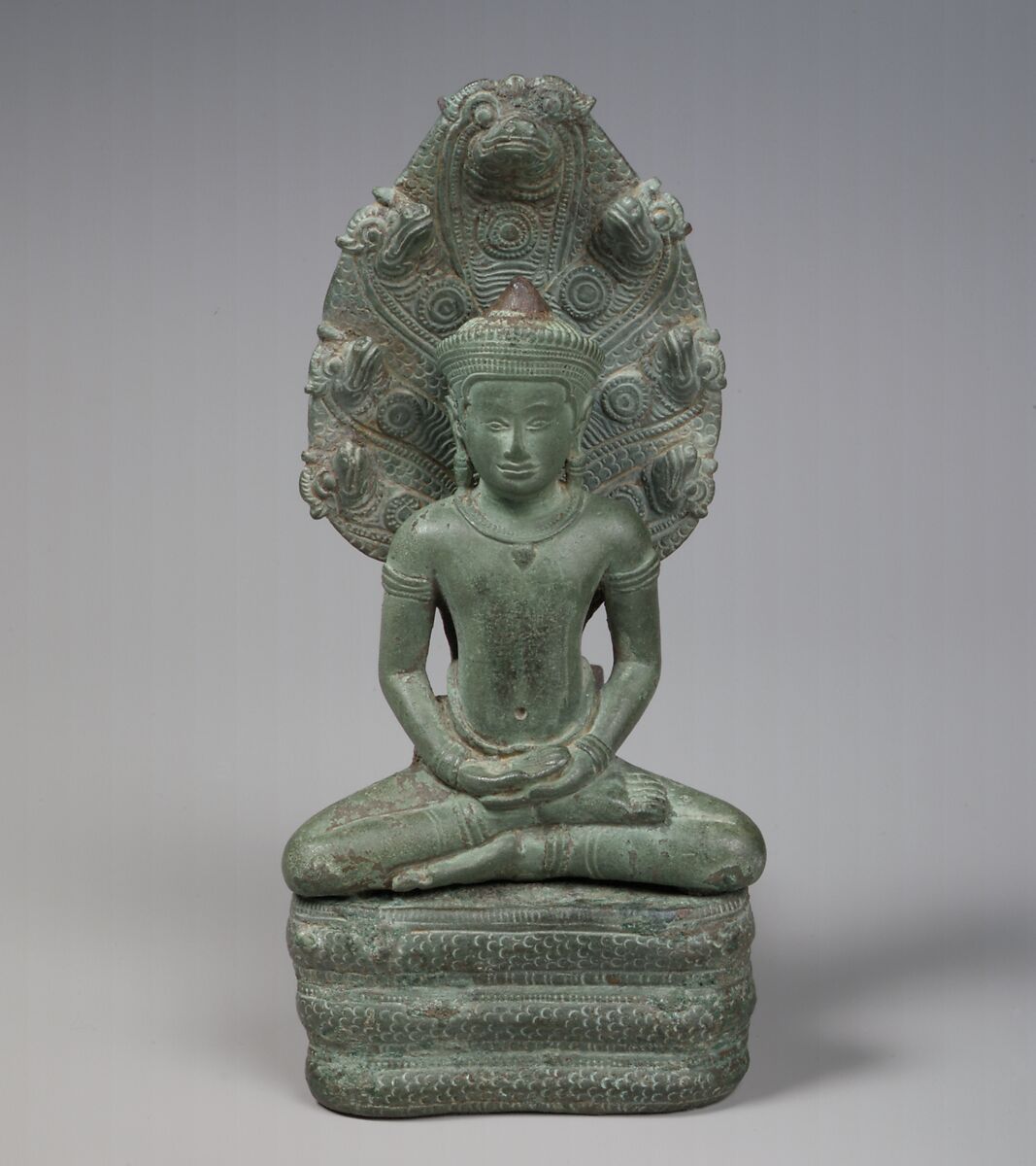 Buddha Sheltered by a Naga, Bronze, Cambodia 