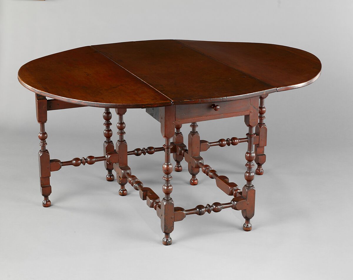 Oval table with falling leaves