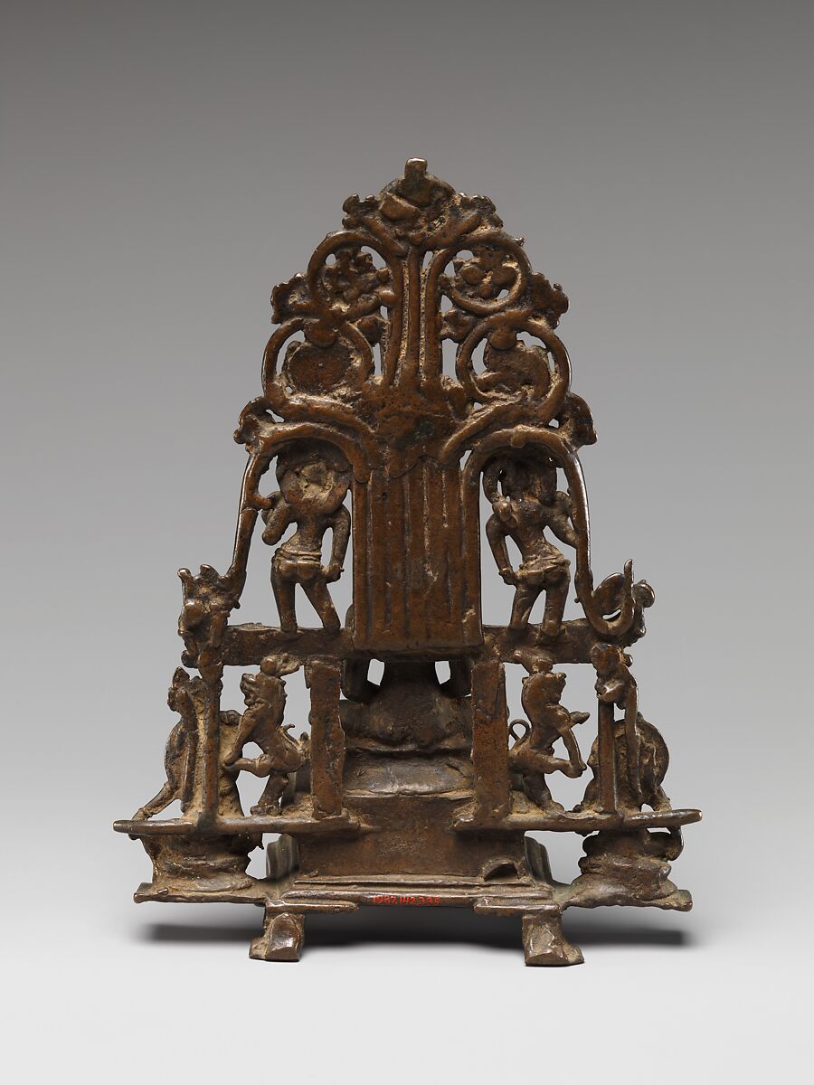 Enthroned Jina Attended by a Yaksha, a Yakshi, and Chauri-Bearers, Copper alloy, India (Karnataka)