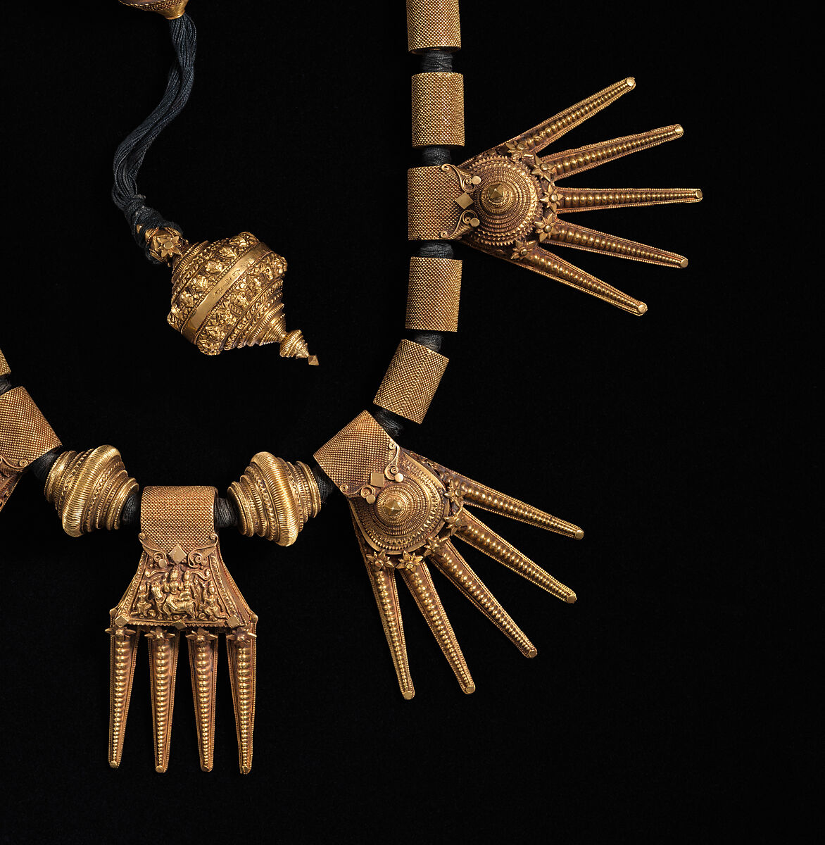 Marriage Necklace (Thali), Gold strung on black thread, India (Tamil Nadu, Chetiar)