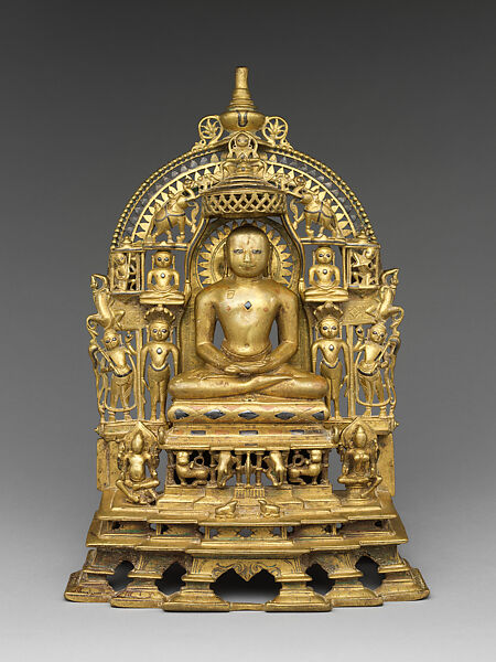Svetambara Enthroned Jina, with Attendant Yaksha and Yakshi, Copper alloy inlaid with silver and copper, India (Gujarat)