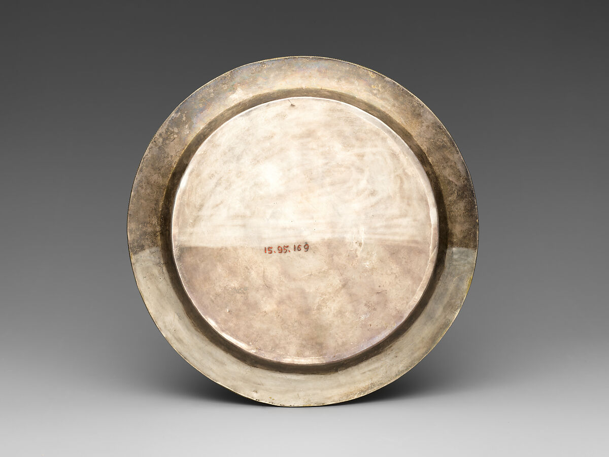 Dish for Ritual Offerings with Durga Defeating a Demon, Gilt silver, emeralds, rubies, sapphires, diamonds, pearls, coral, shell, amber, and semiprecious stones, Nepal