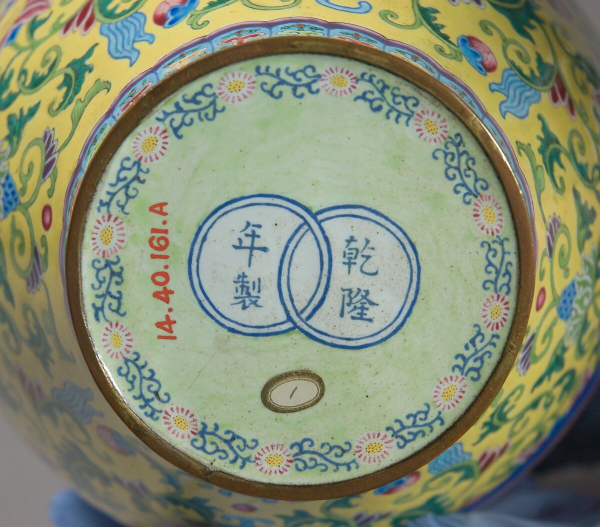 Jar with floral scrolls and wrapped-cloth design (one of a pair), Painted enamel on copper alloy, China