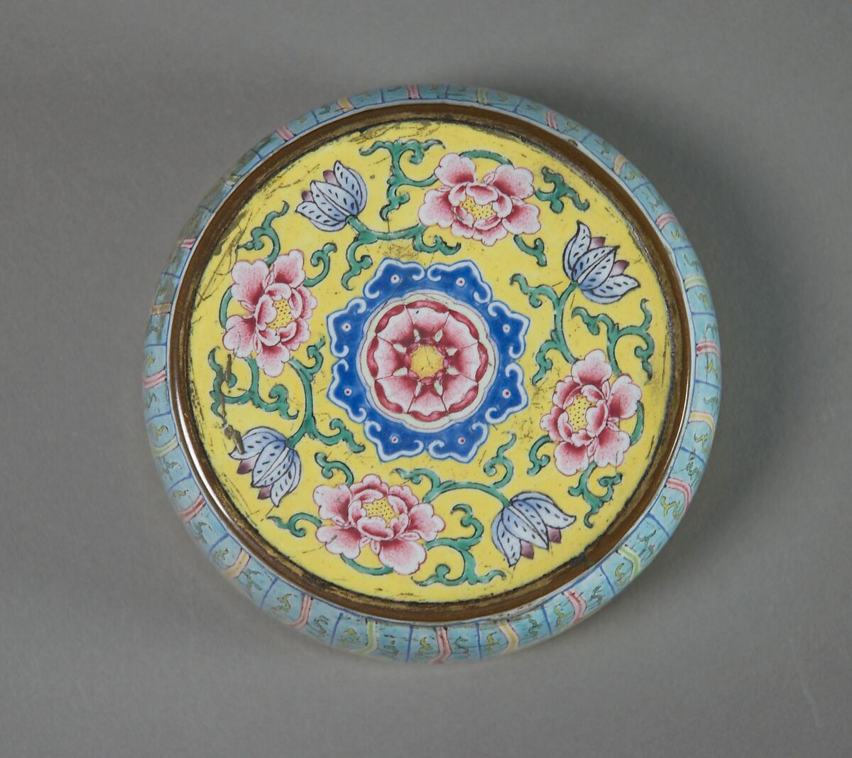 Jar with floral scrolls and wrapped-cloth design (one of a pair), Painted enamel on copper alloy, China