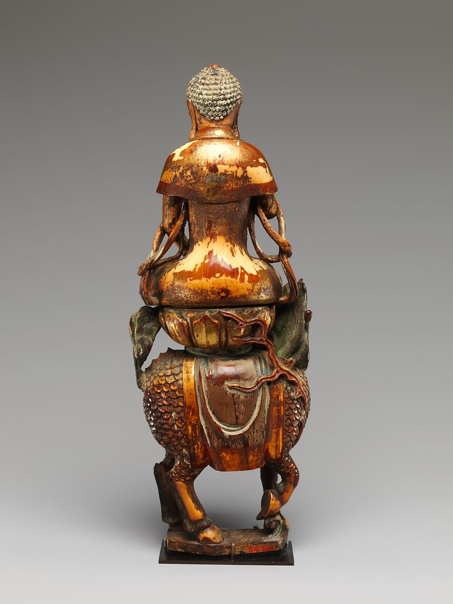 Buddha Shakyamuni with attendant bodhisattvas, Mammoth ivory, China