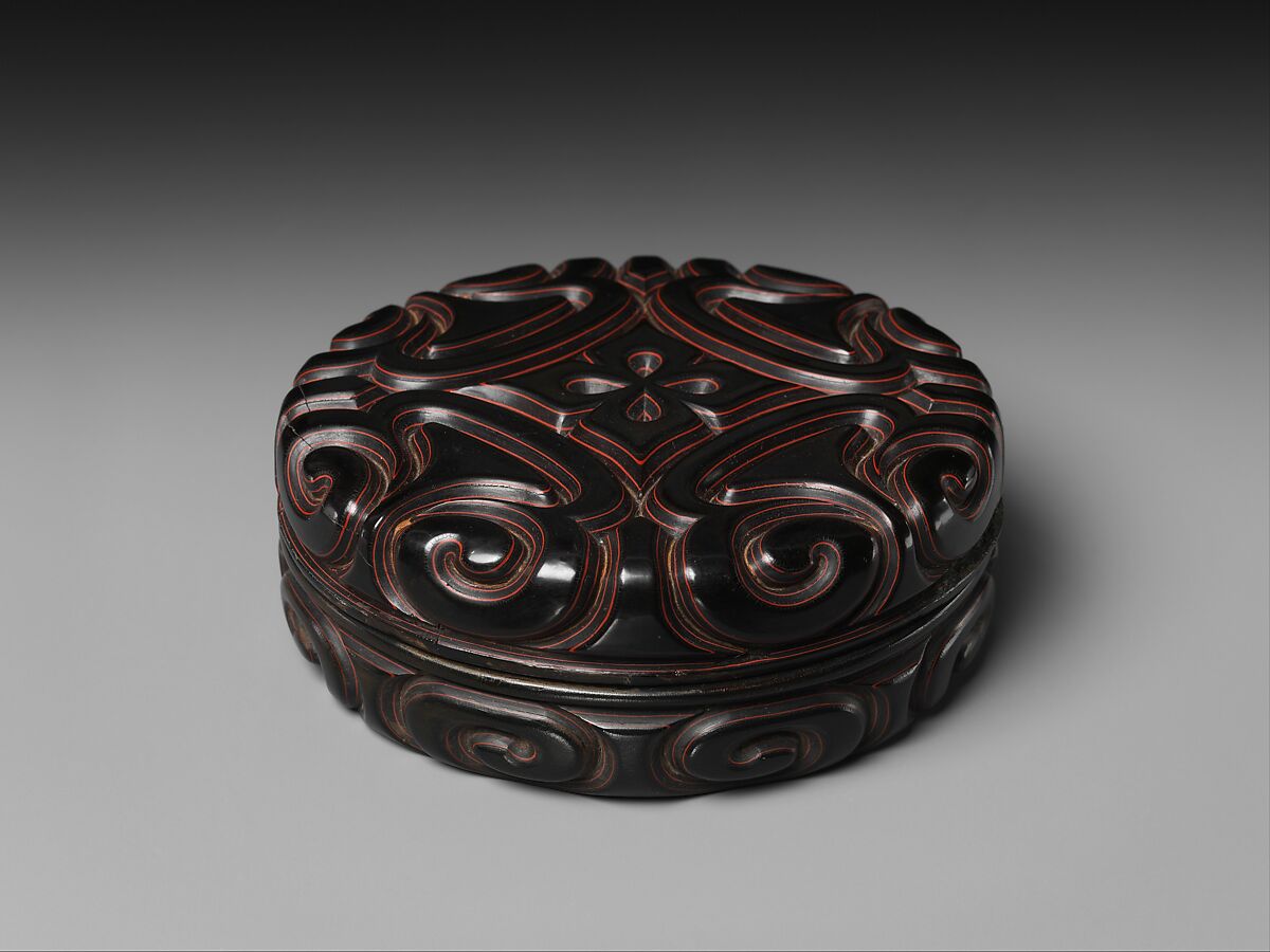 Box with pommel scrolls, Carved red and black lacquer, China 