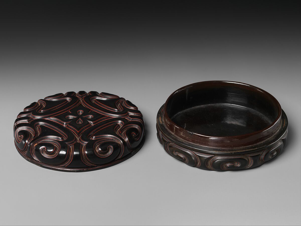 Box with pommel scrolls, Carved red and black lacquer, China