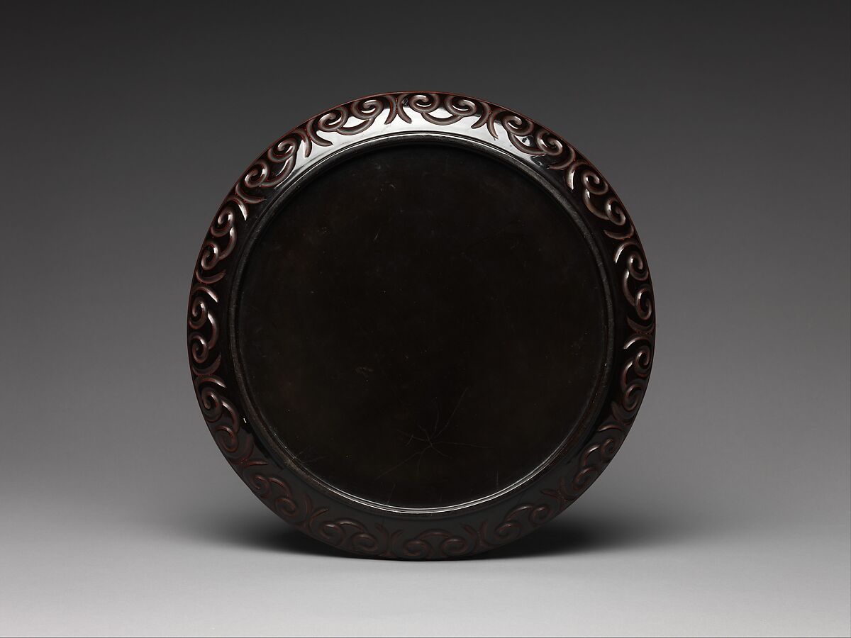 Dish with Pommel Scroll Design, Carved black and red lacquer, China