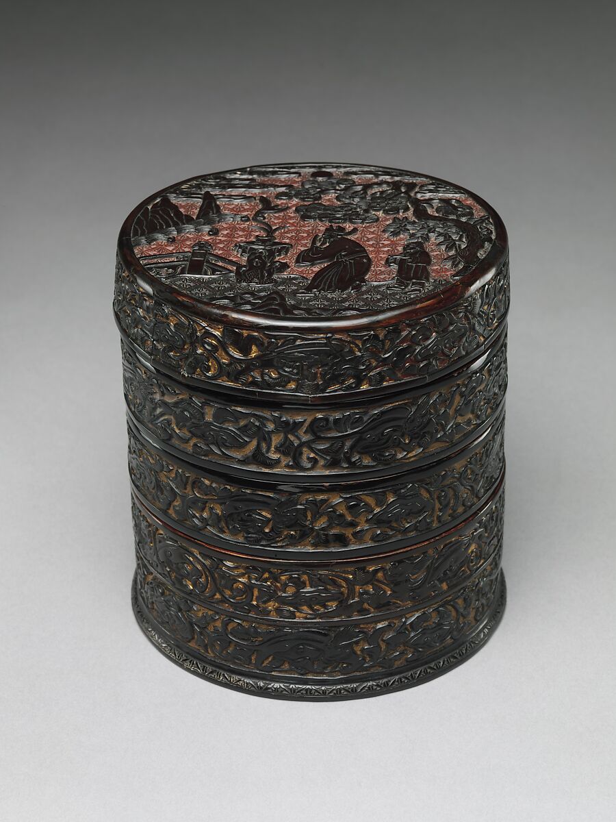 Tiered box with a praying official, Carved black lacquer on gilded ground, China 