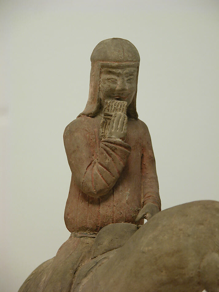 Mounted musician (one of two), Earthenware with pigment, China