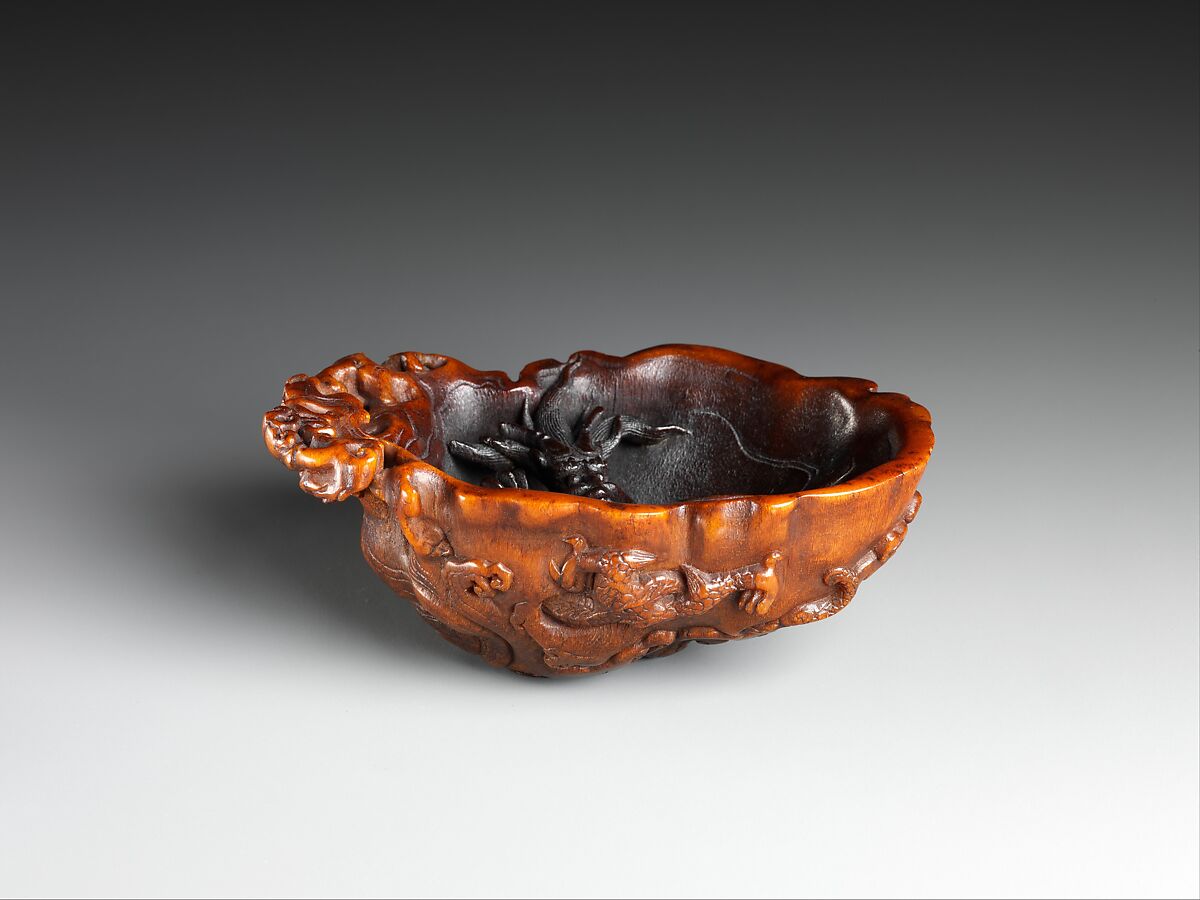 Cup with two dragons in waves, Rhinoceros horn, China 