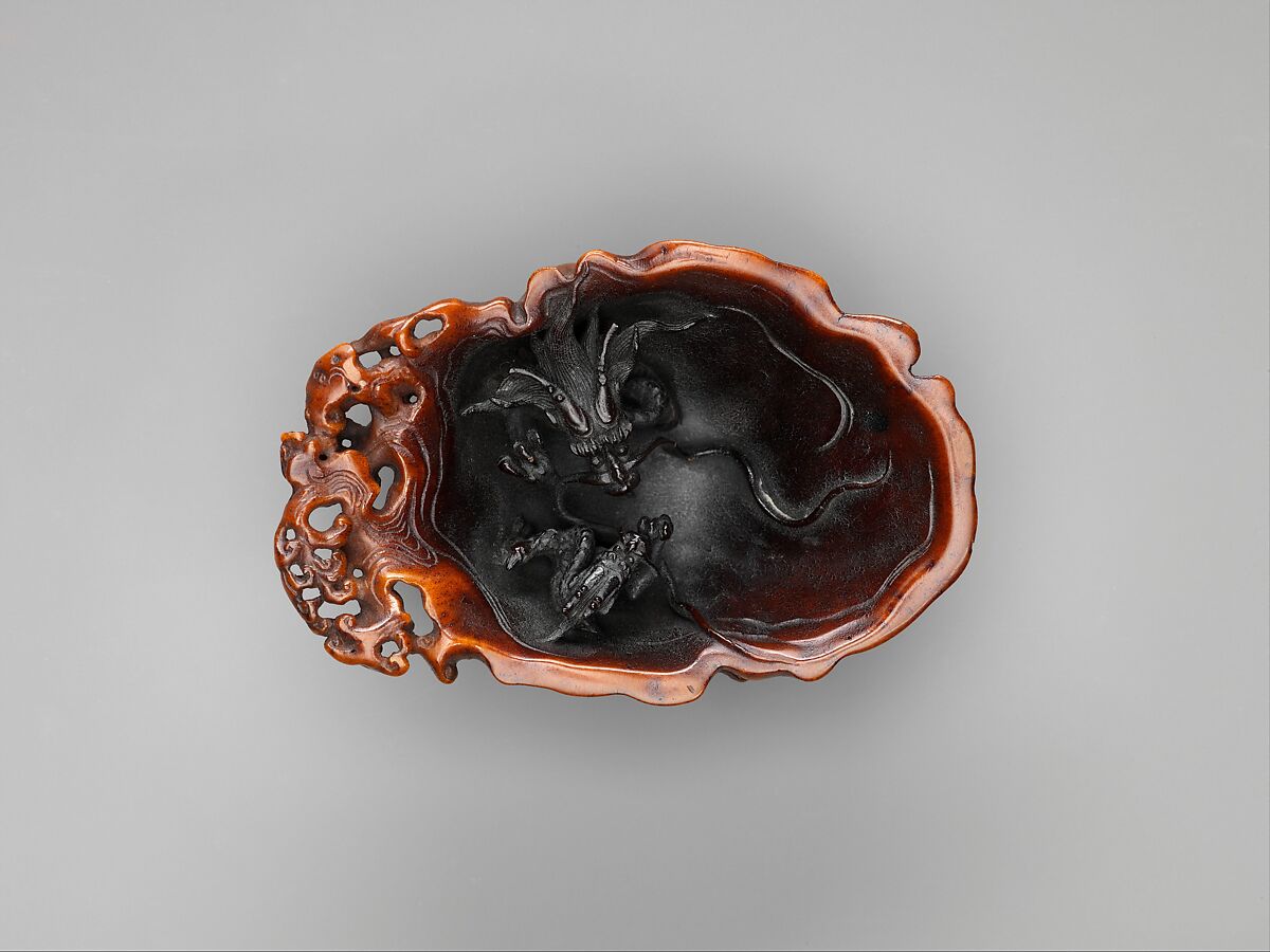 Cup with two dragons in waves, Rhinoceros horn, China