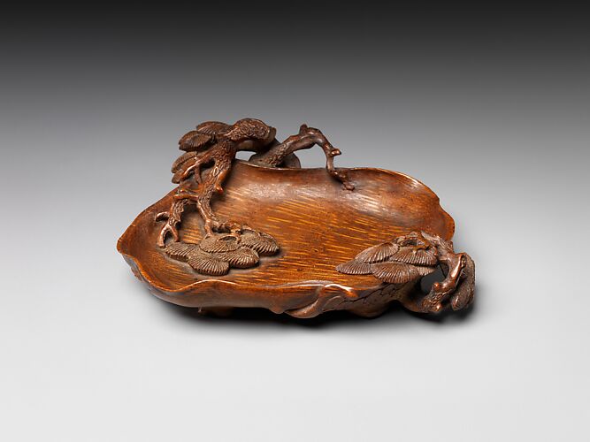 Dish with pine trees