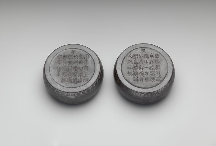 Pair of ink palettes in the form of the Stone Drum