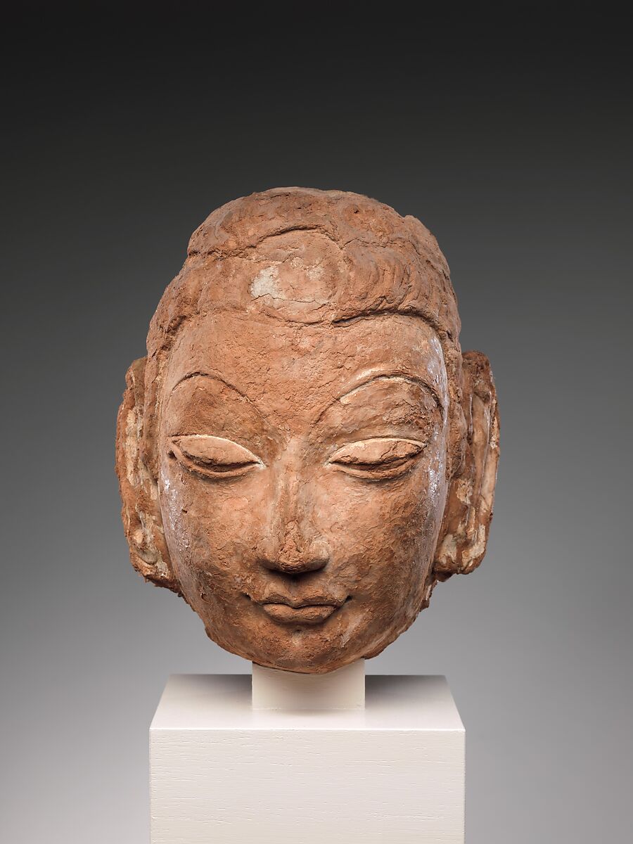 Head of Buddha, Red clay with traces of color, China (Xinjiang Autonomous Region) 