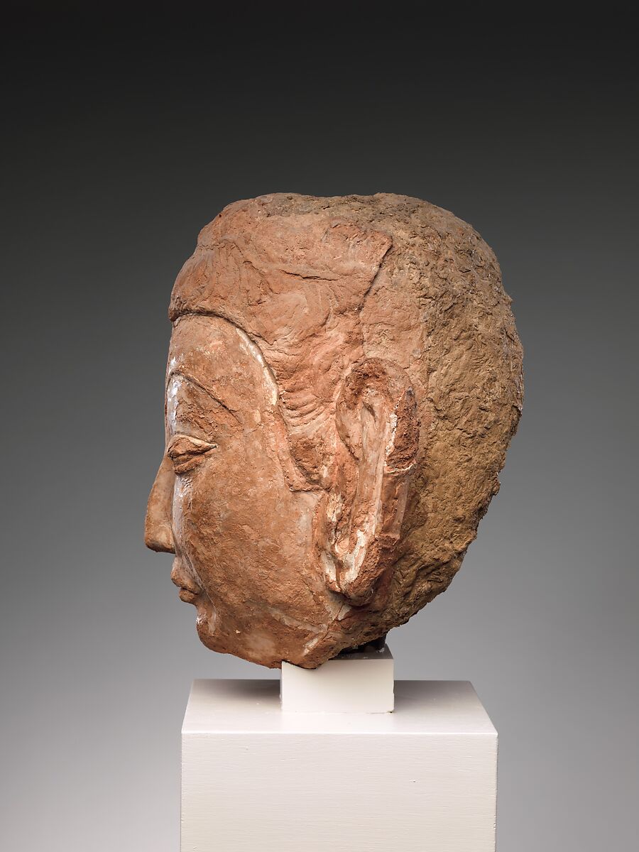 Head of Buddha, Red clay with traces of color, China (Xinjiang Autonomous Region)