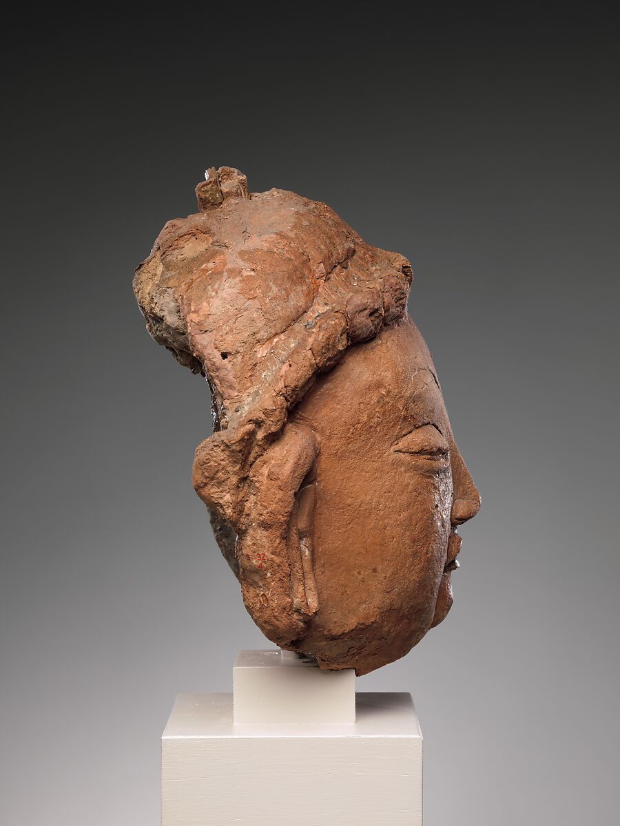 Head of a Bodhisattva, Red clay with traces of color, China (Xinjiang Autonomous Region)