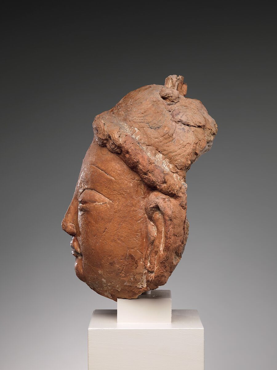 Head of a Bodhisattva, Red clay with traces of color, China (Xinjiang Autonomous Region)