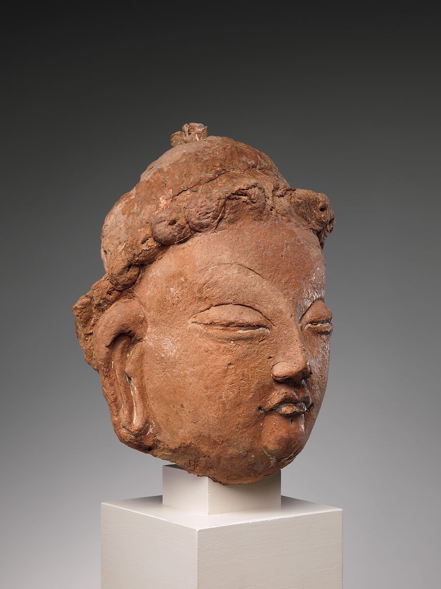 Head of a Bodhisattva, Red clay with traces of color, China (Xinjiang Autonomous Region)