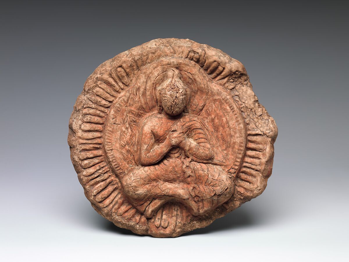 Rondel with Seated Buddha, Red clay with traces of color, China (Xinjiang Autonomous Region) 