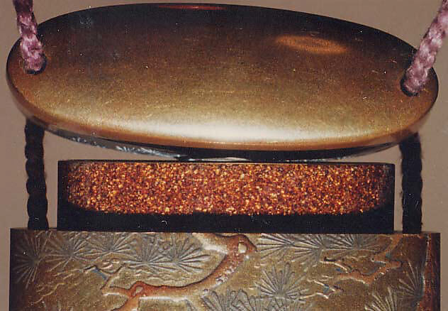 Case (Inrō) with Design of God of Longevity (Jurōjin) and a Small Boy with a Tortoise (obverse); Pine Tree by Stream (reverse), Kakōsai, Gold and nashiji ('pear skin') lacquer with metal inlay and gold, silver, and brown hiramakie sprinkled and polished lacquer; Interior: nashiji and fundame; Ojime: coral bead, Japan