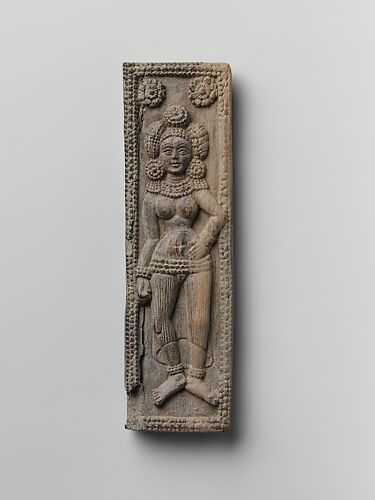 Plaque with Standing Yakshi