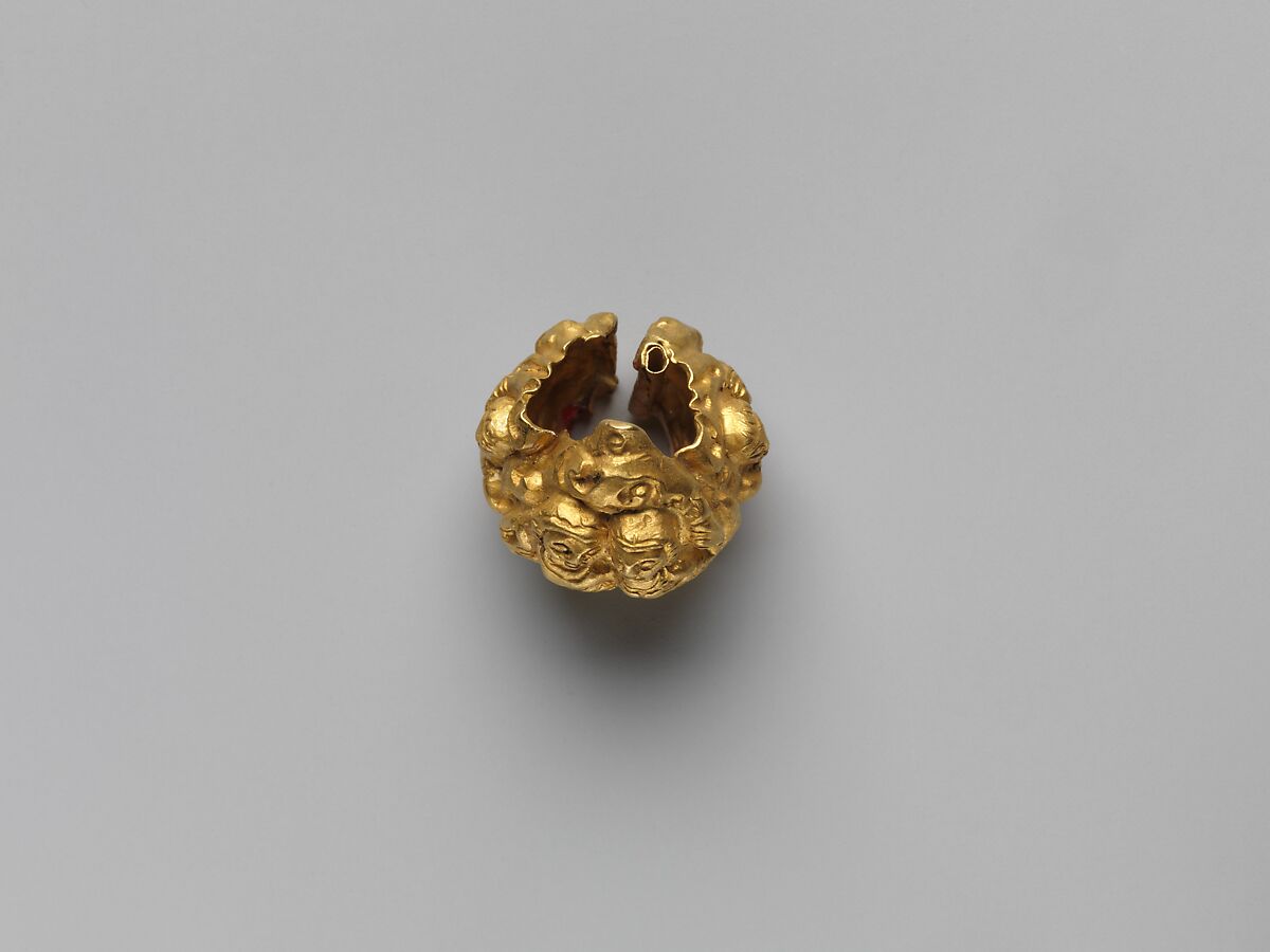 Rod Finial Clip with Deity Surrounded by Sekti Motif, Gold, Indonesia (Java)