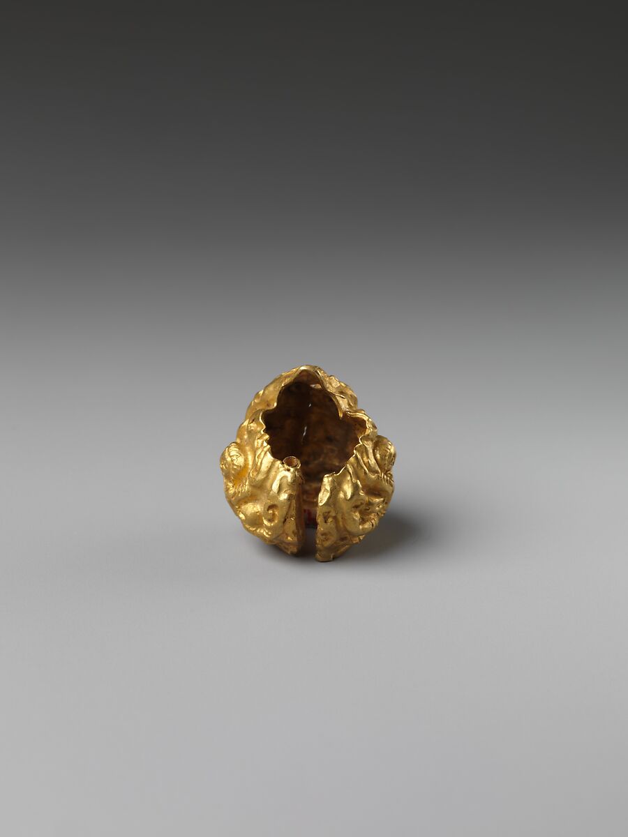 Rod Finial Clip with Deity Surrounded by Sekti Motif, Gold, Indonesia (Java)