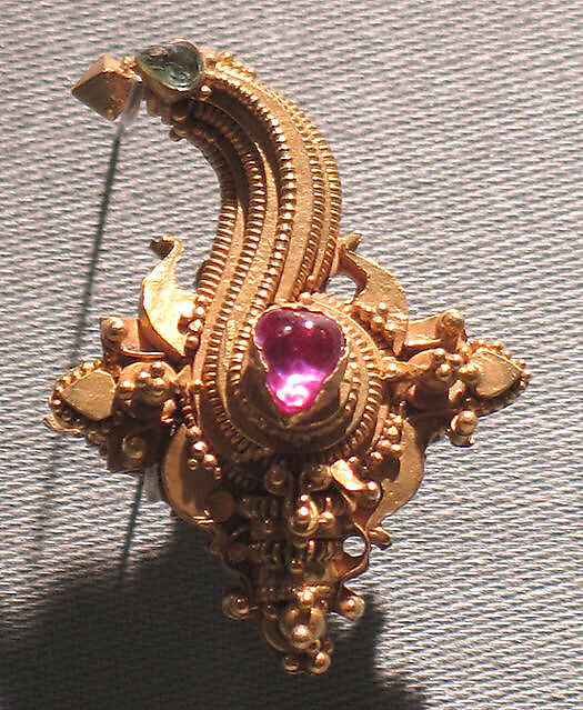 Earclip with Conch Motif and Inlaid Stones, Gold with inlaid stones, Indonesia (Java) 