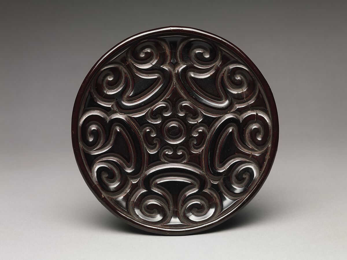 Dish with pommel scrolls, Carved black, red, and yellow lacquer (tixi), China 