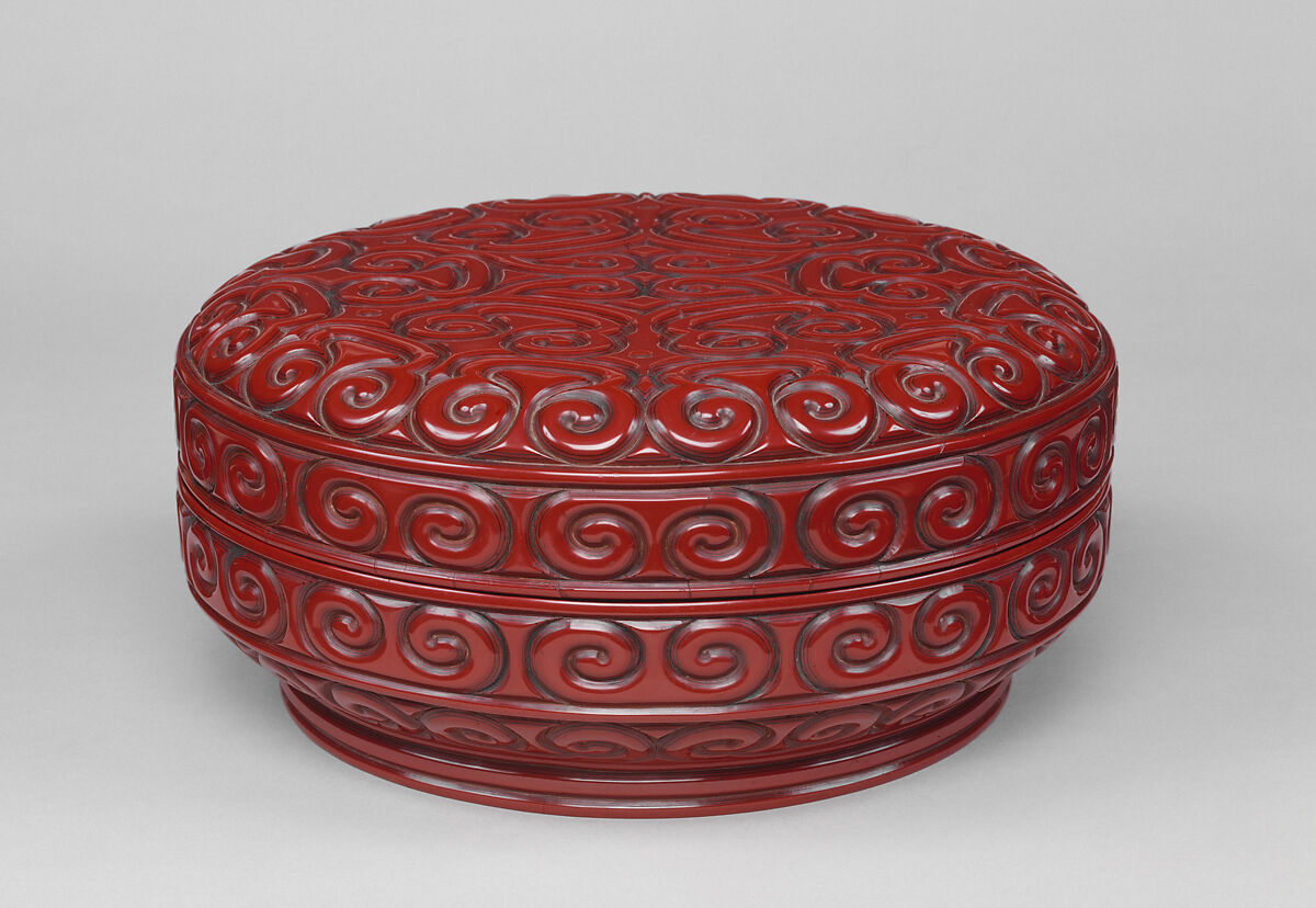Box with pommel scroll design, Carved red and black lacquer, China