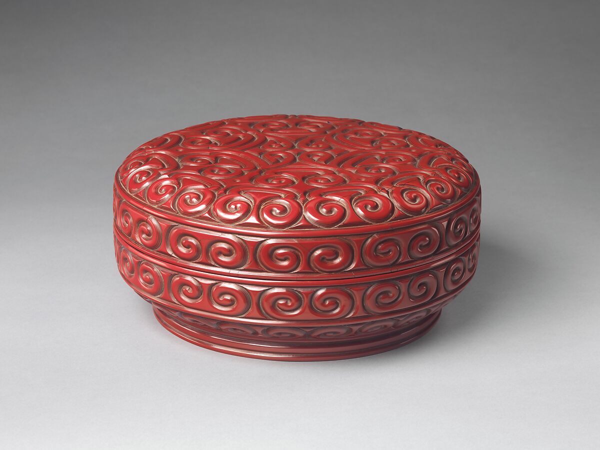 Box with pommel scroll design, Carved red and black lacquer, China 
