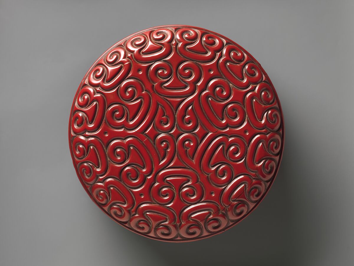Box with pommel scroll design, Carved red and black lacquer, China