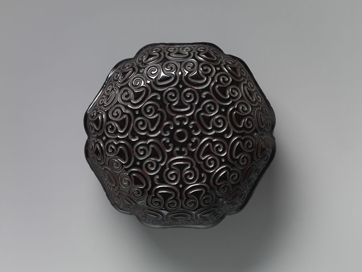 Hexagonal box with inverted corners, Carved black lacquer with red layers, China