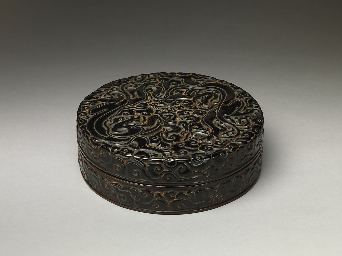 Box with chi dragons amid clouds, Carved black, red, and yellow lacquer, China 