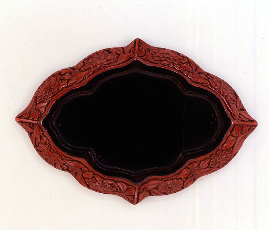 Lozenge-shaped dish with garden scene, Carved red lacquer, China