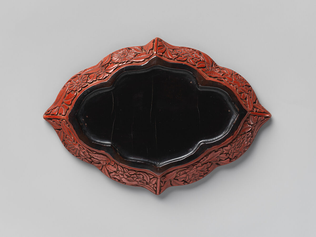 Lozenge-shaped dish with garden scene, Carved red lacquer, China