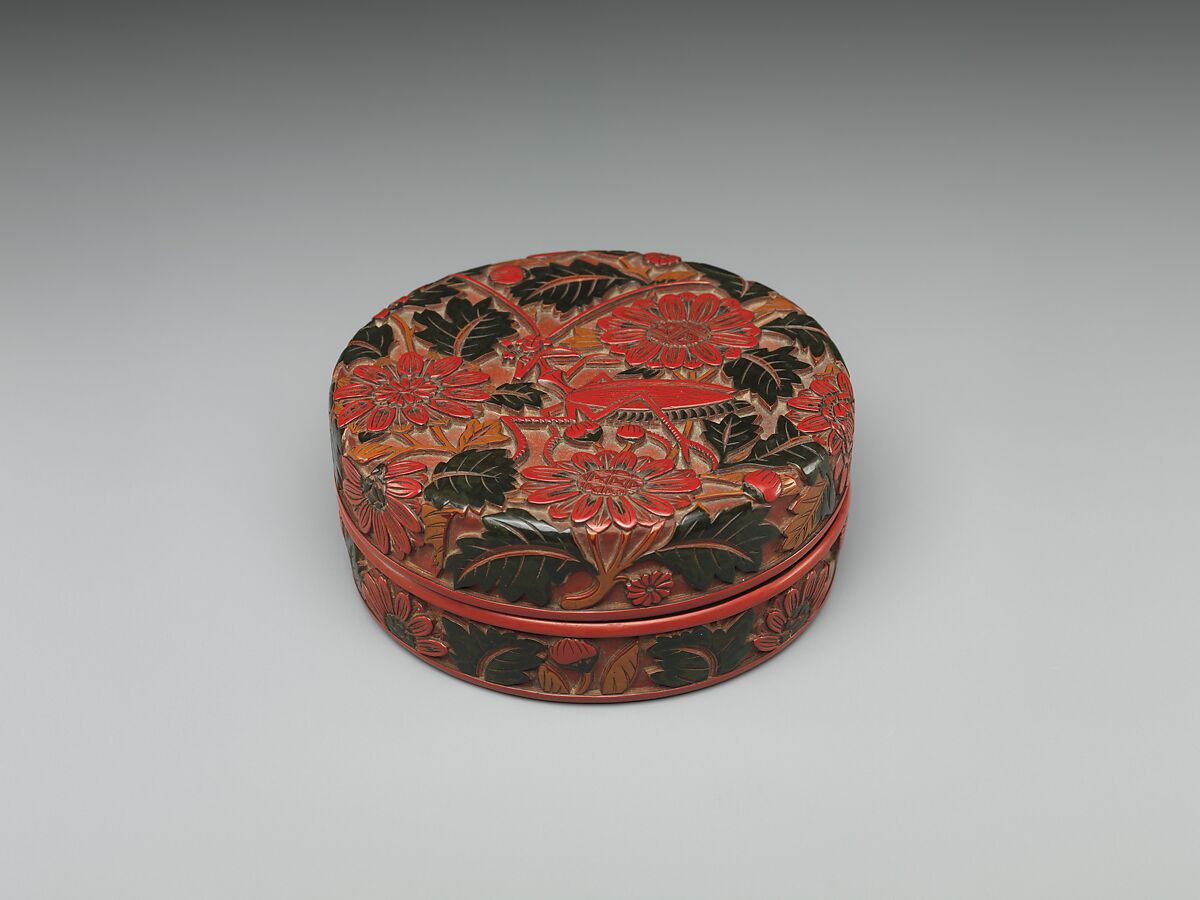 Box with chrysanthemum and praying mantis, Carved red and black lacquer, China 