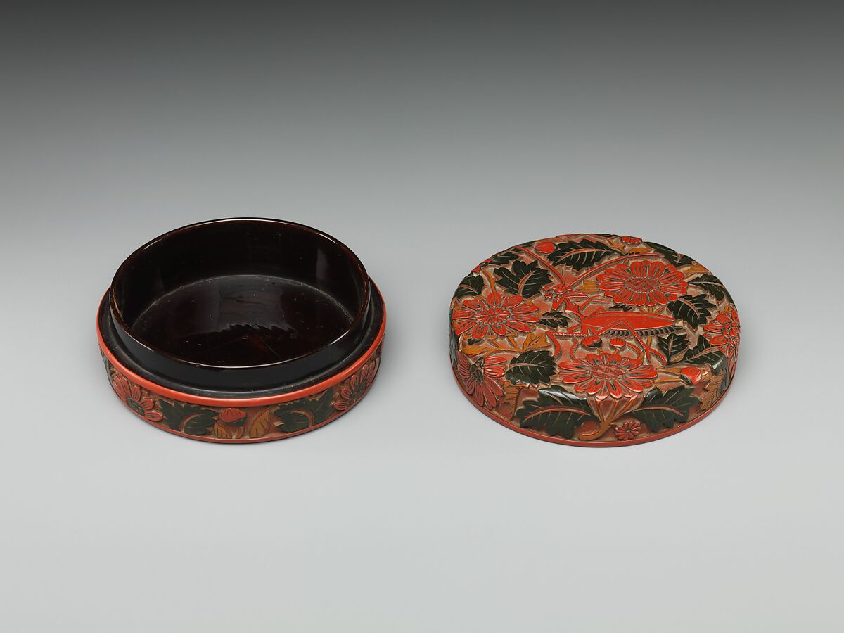 Box with chrysanthemum and praying mantis, Carved red and black lacquer, China