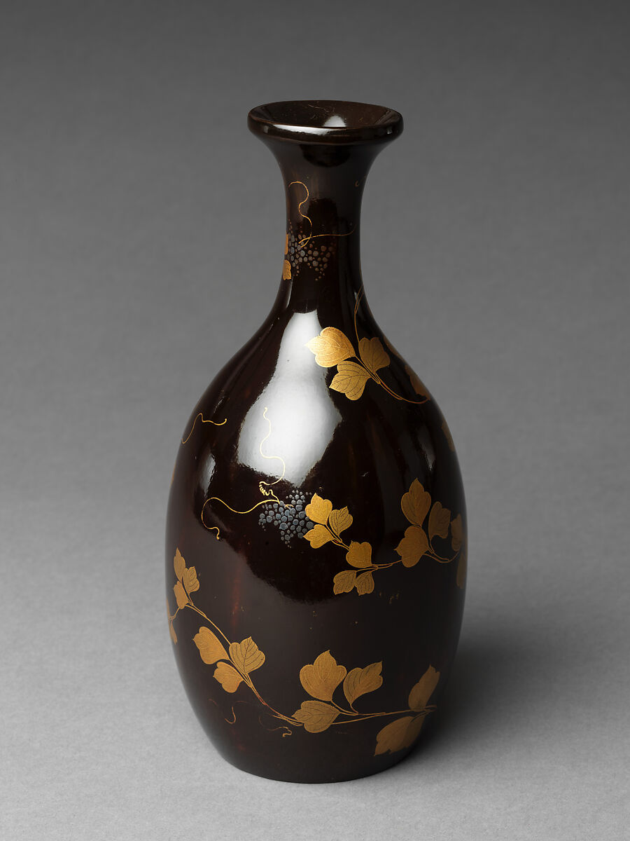 Sake bottle with grapevine decoration, Gold and silver makie on black lacquer, Japan