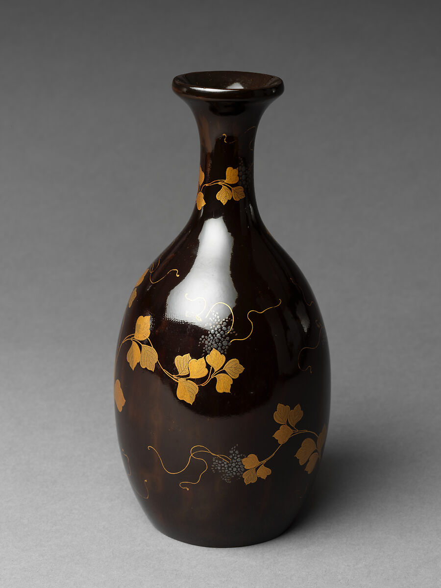 Sake bottle with grapevine decoration, Gold and silver makie on black lacquer, Japan