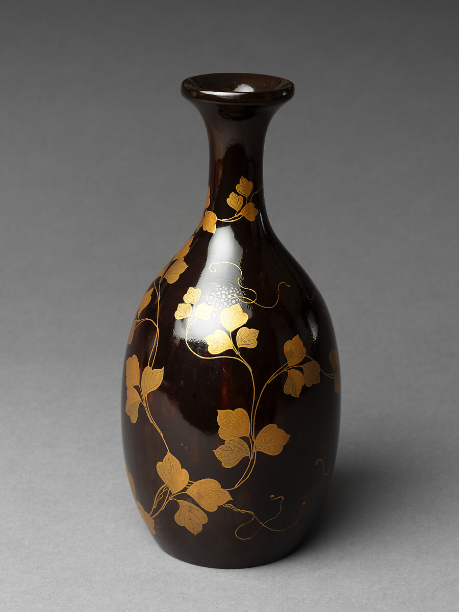 Sake bottle with grapevine decoration, Gold and silver makie on black lacquer, Japan 