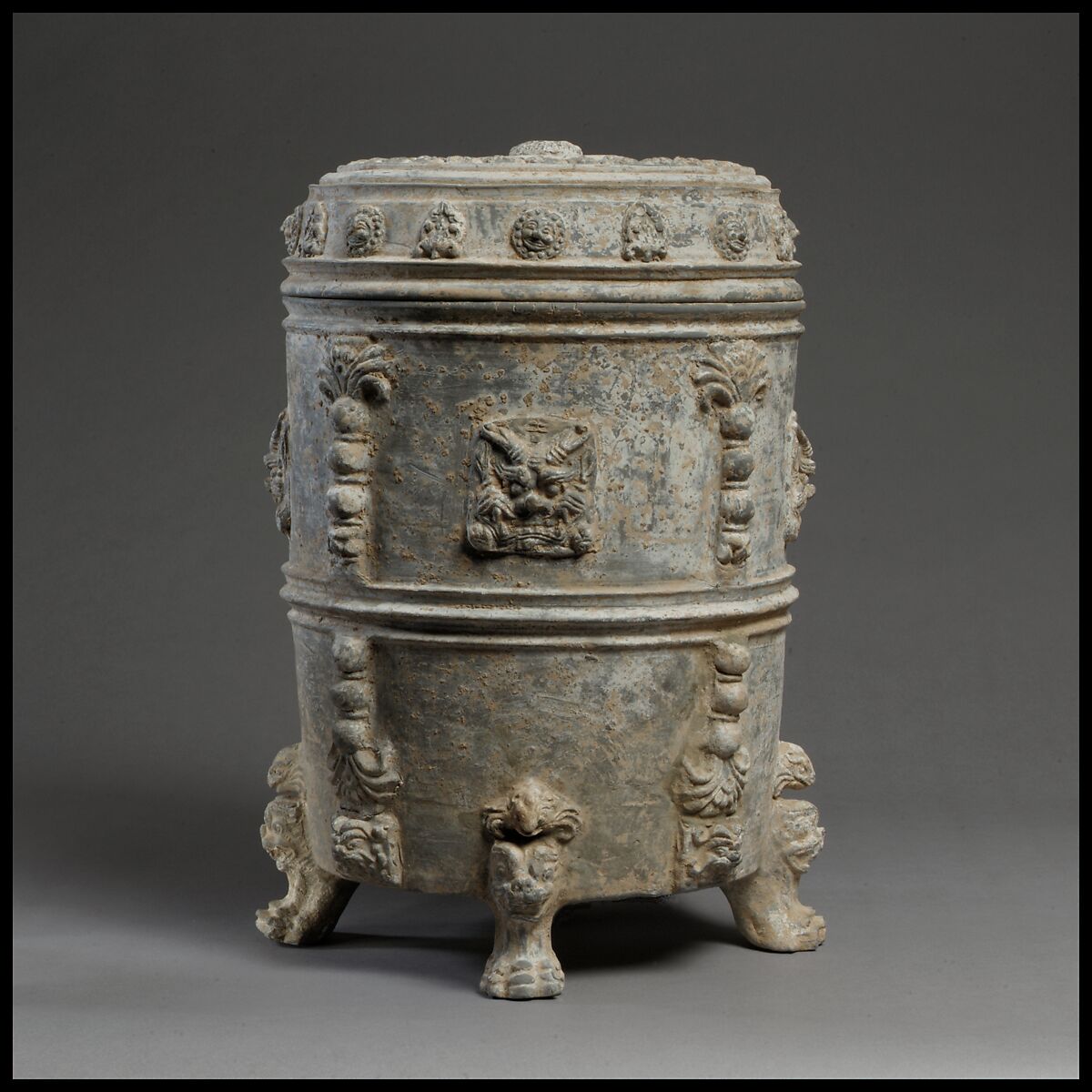 Covered footed vessel, Earthenware with applied-relief decoration under white slip, China