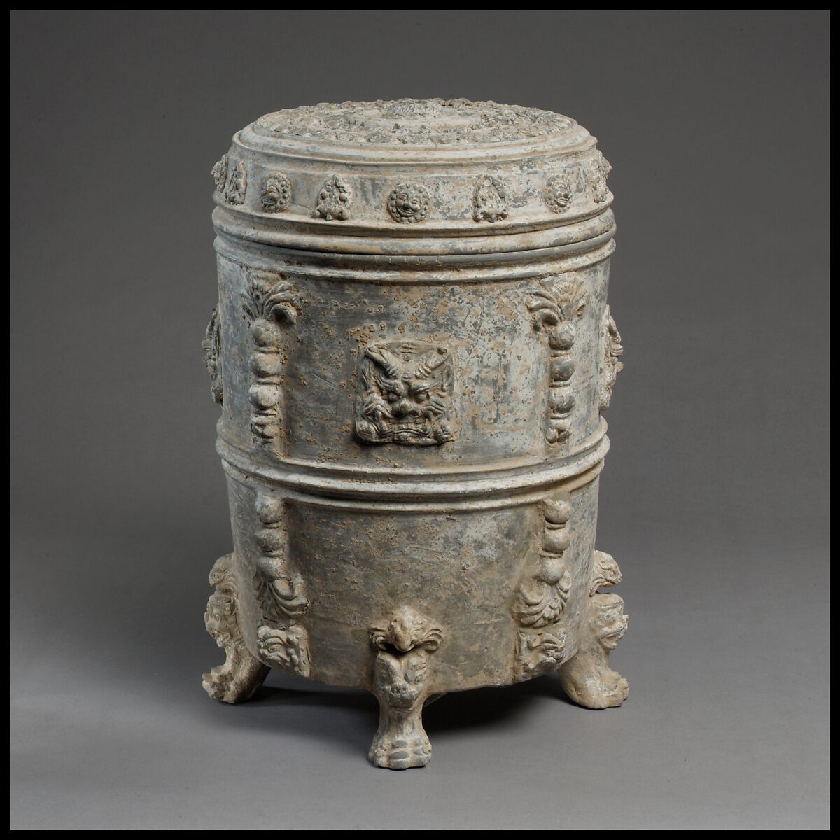 Covered footed vessel, Earthenware with applied-relief decoration under white slip, China
