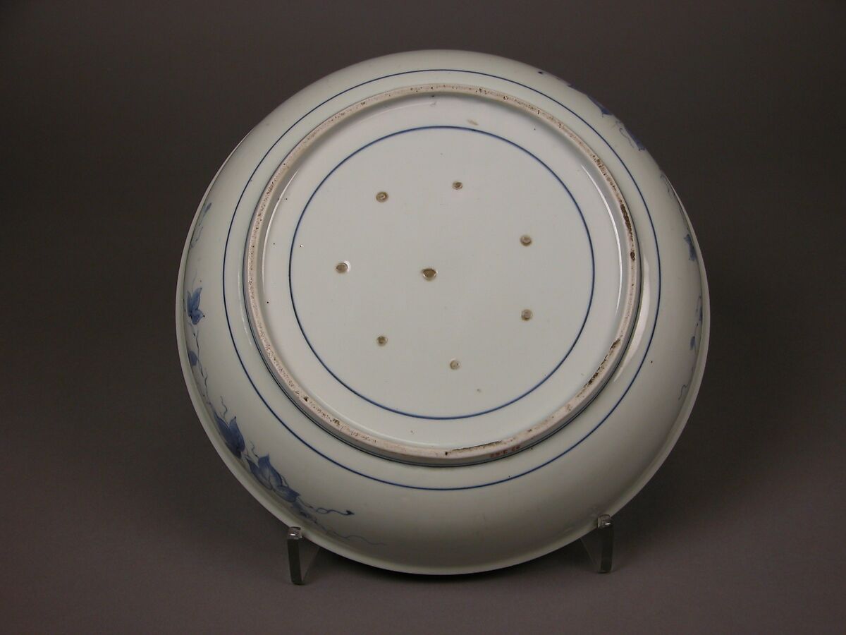 Shallow Bowl with Design of Dragon amid Waves, Phoenix, and Flowers, Porcelain with overglaze enamels (Hizen ware, Arita region, Kakiemon style), Japan