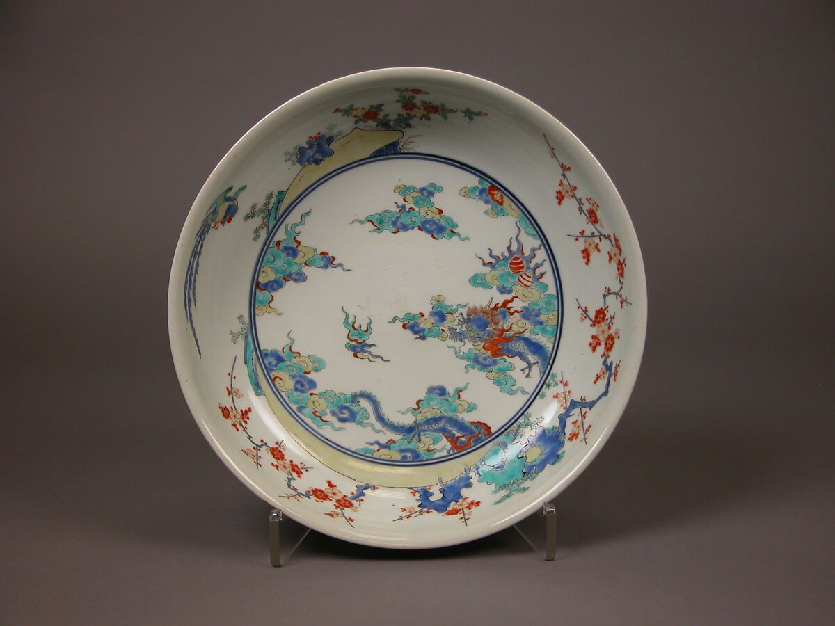 Shallow Bowl with Design of Dragon amid Waves, Phoenix, and Flowers, Porcelain with overglaze enamels (Hizen ware, Arita region, Kakiemon style), Japan 