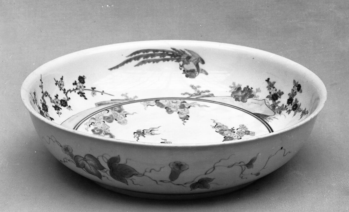 Shallow Bowl with Design of Dragon amid Waves, Phoenix, and Flowers, Porcelain with overglaze enamels (Hizen ware, Arita region, Kakiemon style), Japan